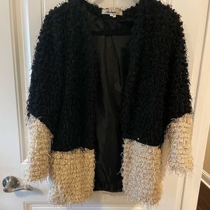 Black and Cream color block boutique shag jacket. Size S.